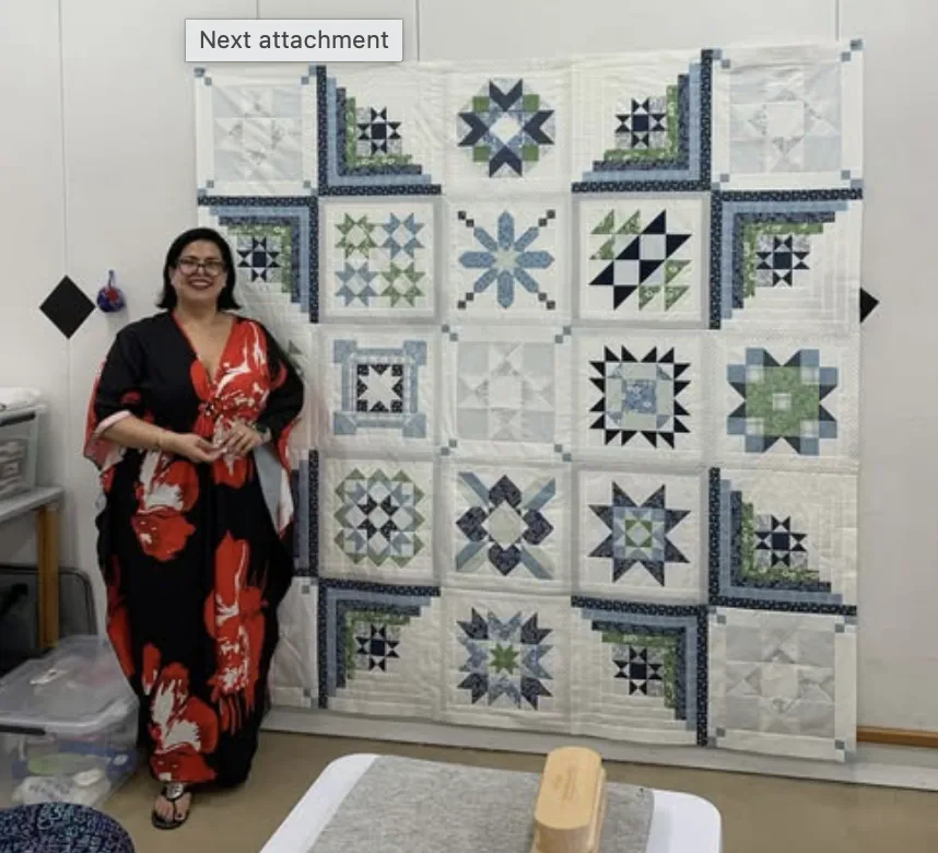 Finished quilt on the design wall