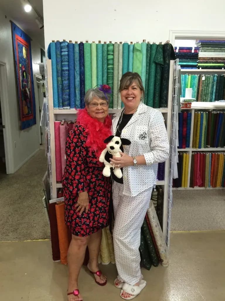 Two guests in costume posing in the Shoppe
