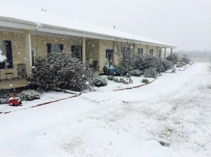 The Compass Centre building after a light snowfall